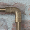 20mm Conduit Elbow in Antiqued Brass