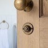 Ellwood Privacy Lock in Antiqued Brass