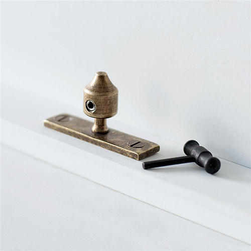 Lockable stay pin in antiqued brass