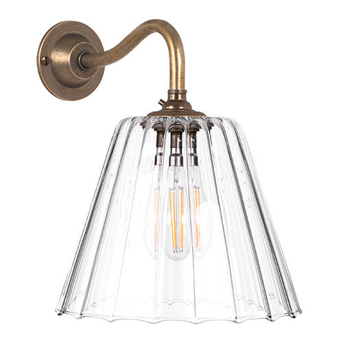 Ashley Fluted Wall Light with Carrick Arm in Antiqued Brass