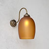 Clifton Amber Wall Light in Antiqued Brass