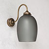 Clifton Smoked Wall Light in Antiqued Brass