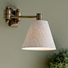 Clayton Wall Light in Antiqued Brass