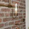 Single Morston Conduit Wall Light in Antiqued Brass