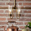 Double Morston Conduit Wall Light in Antiqued Brass