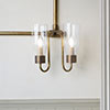 Double Morston Conduit Wall Light in Antiqued Brass