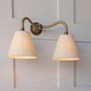 Double Carrick Wall Light in Antiqued Brass