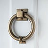 Westley Door Knocker in Antiqued Brass