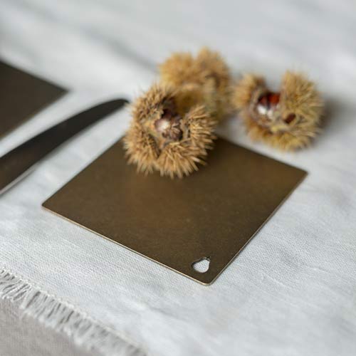 Square coaster in lacquered antiqued brass
