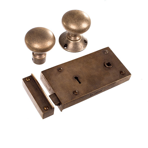 Rim lock with Holkham door knobs