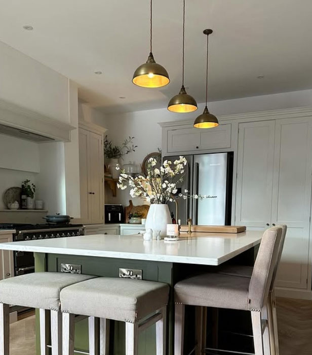 Butler pendants above kitchen island Butler pendants above kitchen island